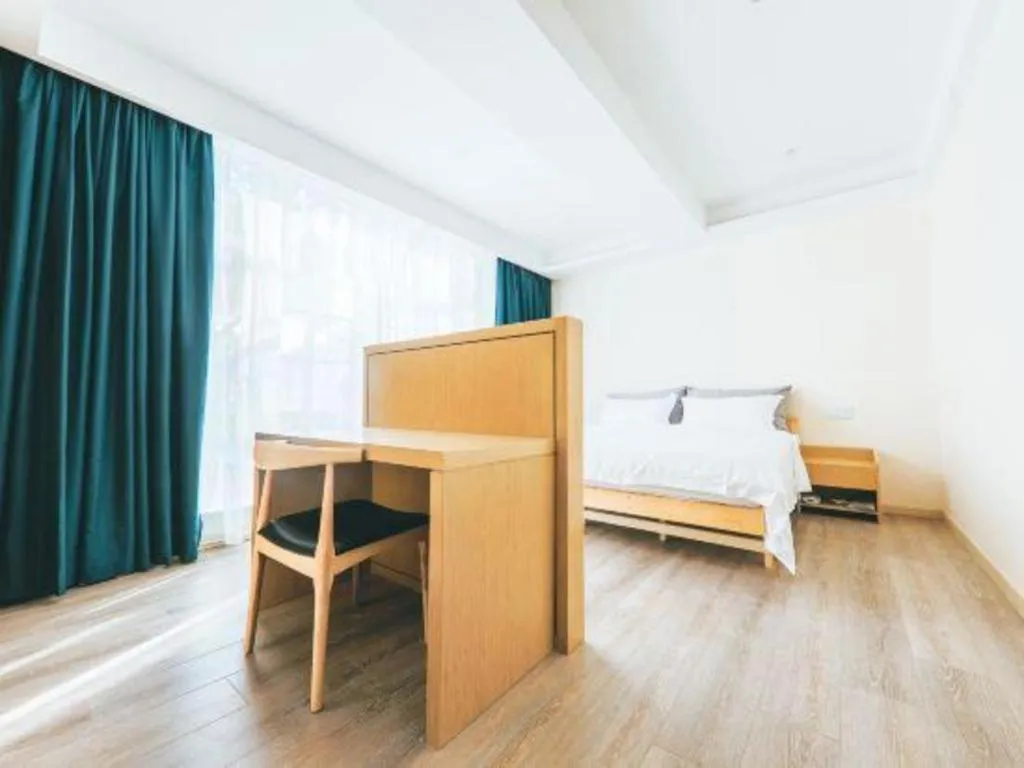 Bed in ZMAX Hotels Wuhan East Lake