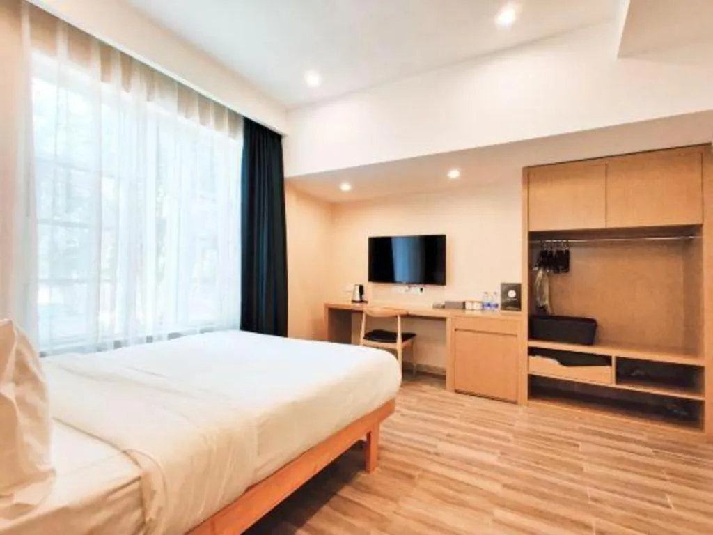 Bed in ZMAX Hotels Wuhan East Lake