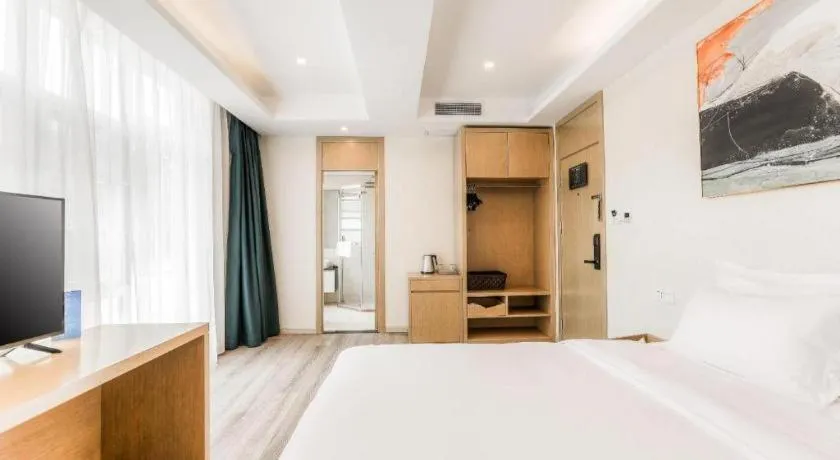 Bed in ZMAX Hotels Wuhan East Lake