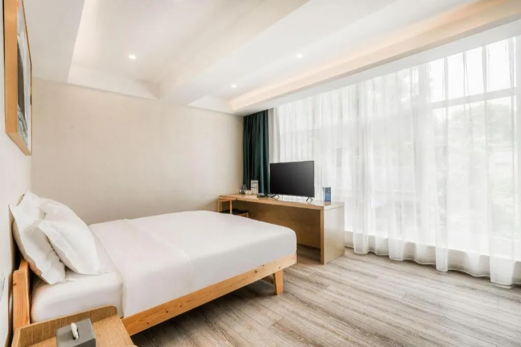 Bed in ZMAX Hotels Wuhan East Lake