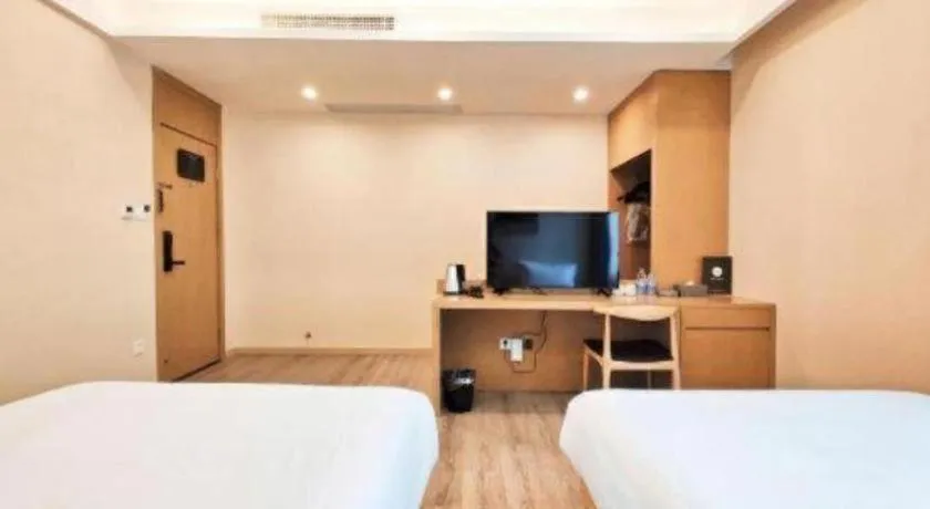 Bed in ZMAX Hotels Wuhan East Lake