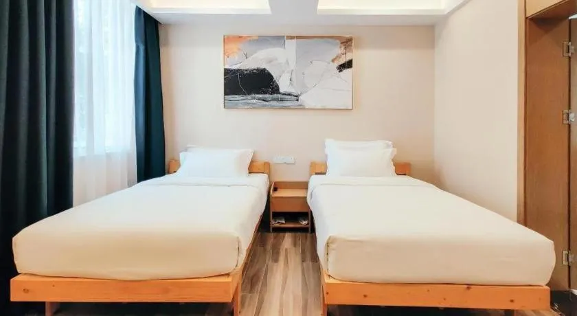Bed in ZMAX Hotels Wuhan East Lake