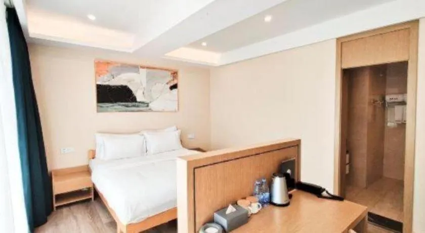 Bed in ZMAX Hotels Wuhan East Lake