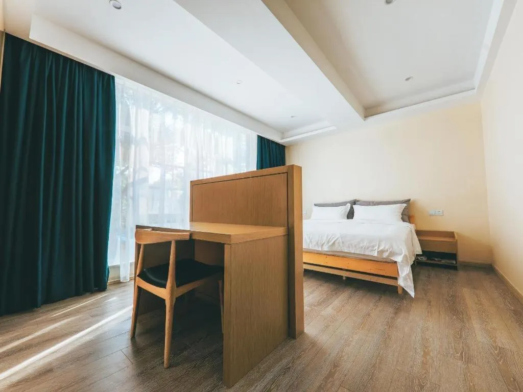 Bed in ZMAX Hotels Wuhan East Lake