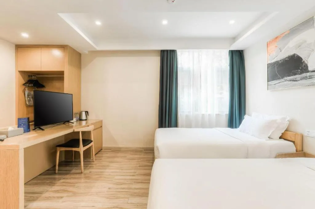 Bed in ZMAX Hotels Wuhan East Lake