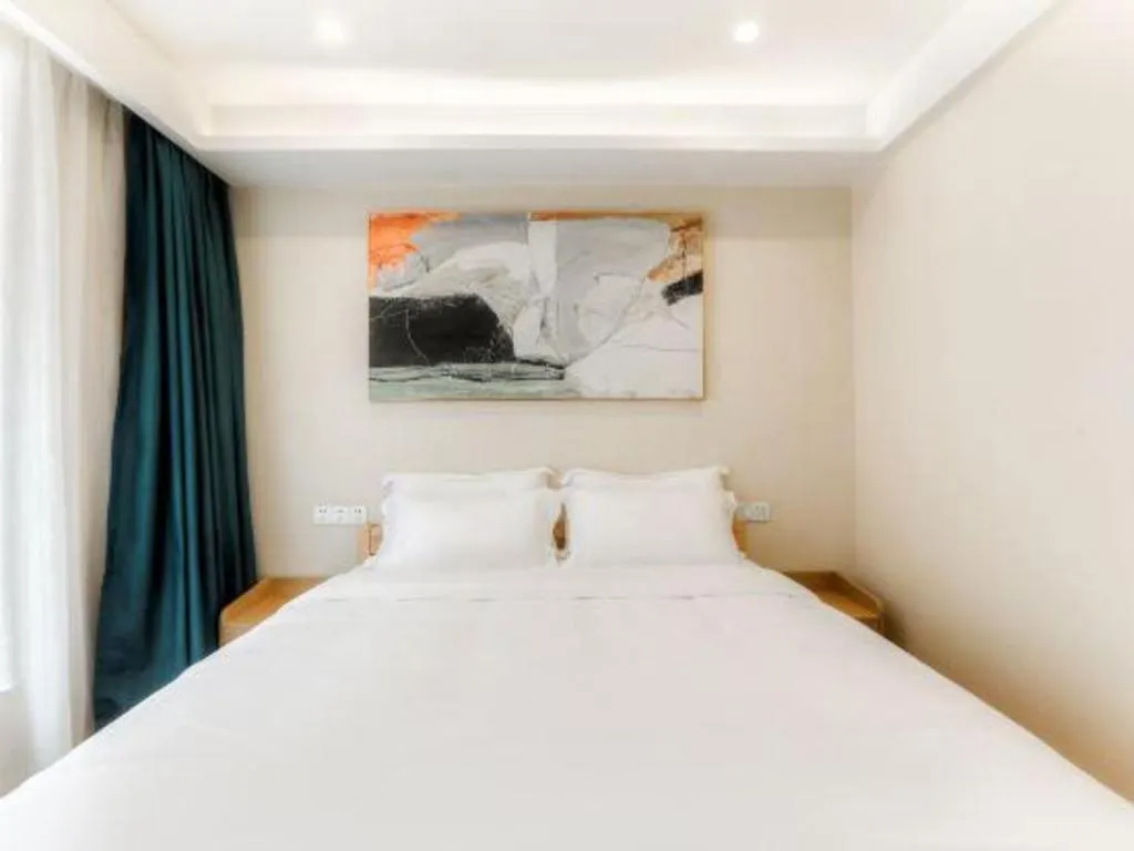 Bed in ZMAX Hotels Wuhan East Lake