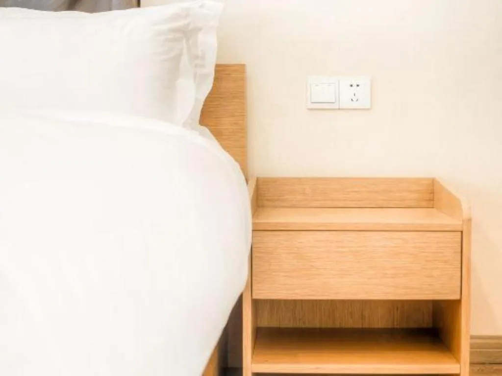 Bed in ZMAX Hotels Wuhan East Lake