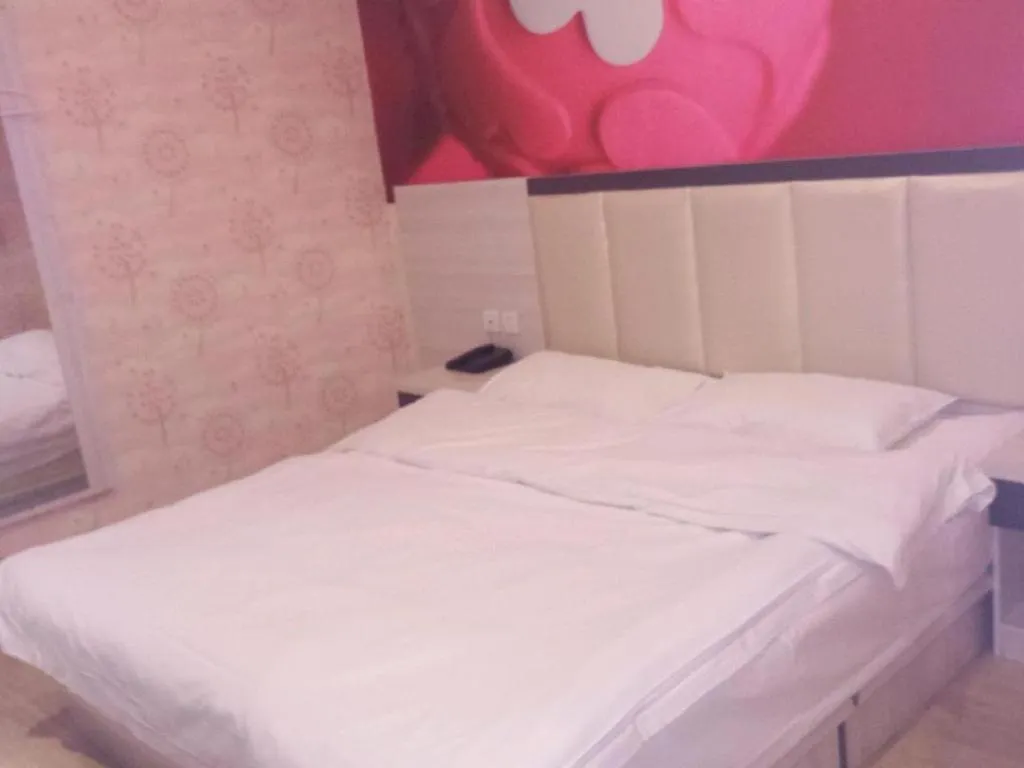 Bed in PAI Hotels Beijing Tongzhou Majuqiao