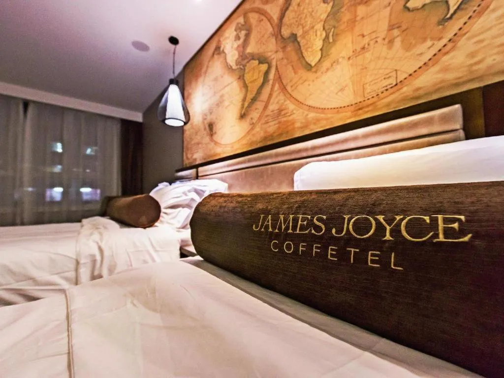 Bed in James Joyce Coffetel Jilin Railway Station Fortune Plaza