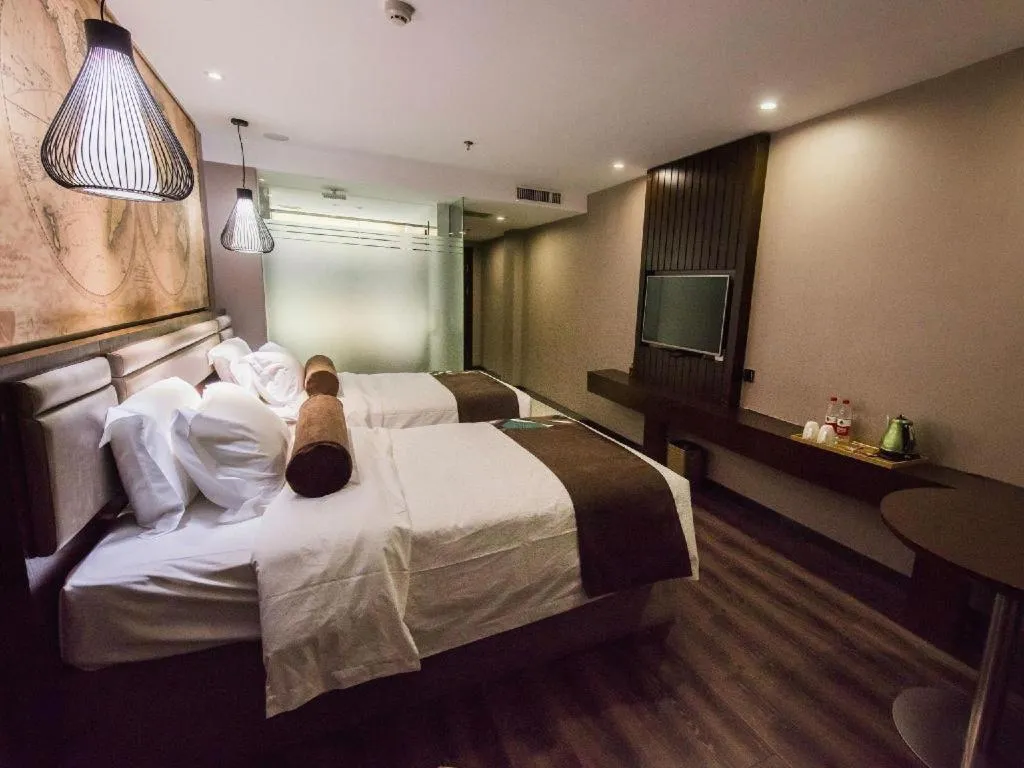 Bed in James Joyce Coffetel Jilin Railway Station Fortune Plaza