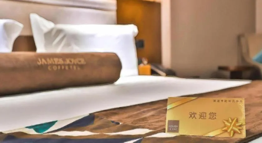 Bed in James Joyce Coffetel Jilin Railway Station Fortune Plaza