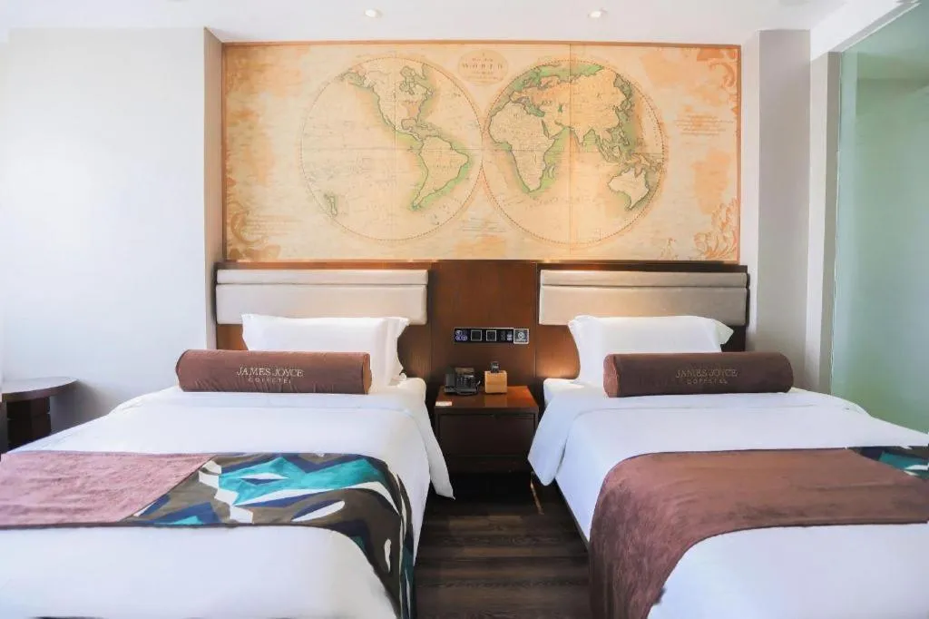 Bed in James Joyce Coffetel Jilin Railway Station Fortune Plaza