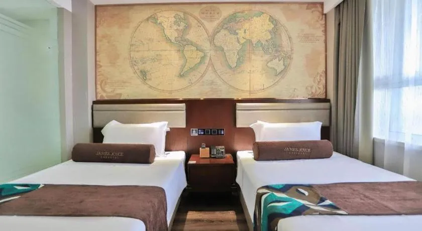 Bed in James Joyce Coffetel Jilin Railway Station Fortune Plaza