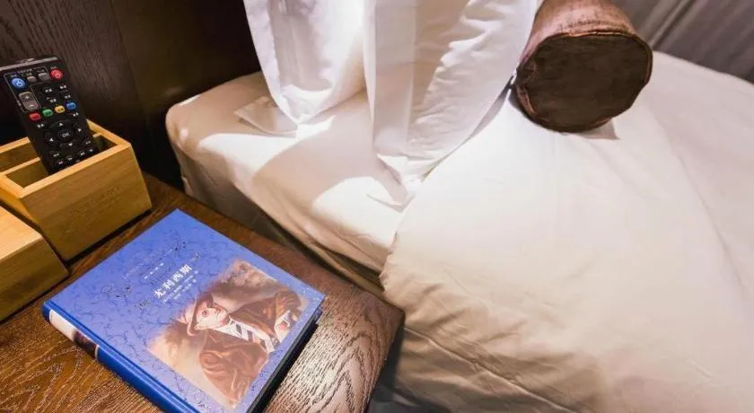 Bed in James Joyce Coffetel Jilin Railway Station Fortune Plaza