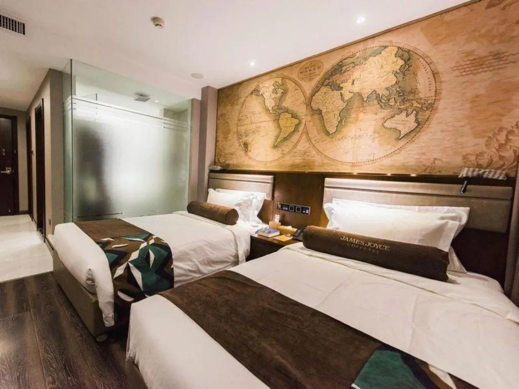 Bed in James Joyce Coffetel Jilin Railway Station Fortune Plaza