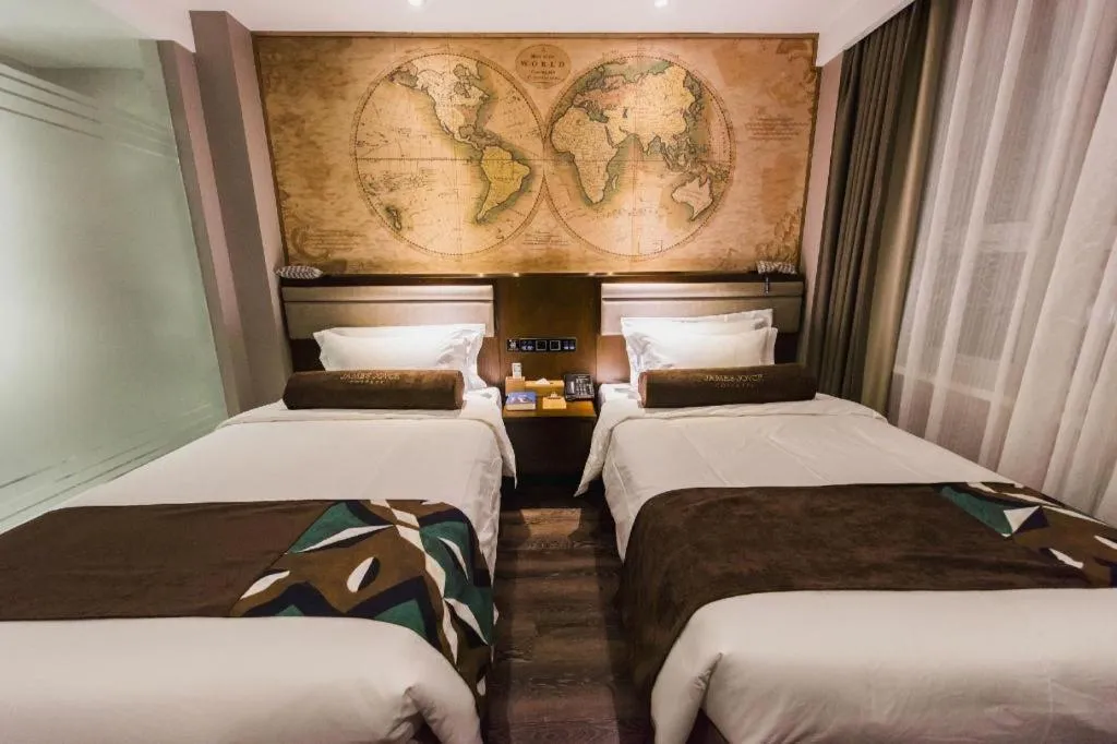 Bed in James Joyce Coffetel Jilin Railway Station Fortune Plaza