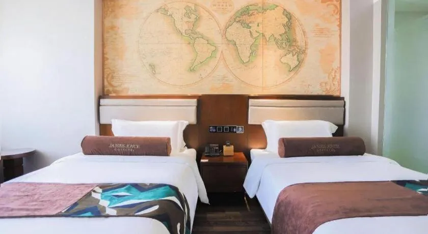 Bed in James Joyce Coffetel Jilin Railway Station Fortune Plaza