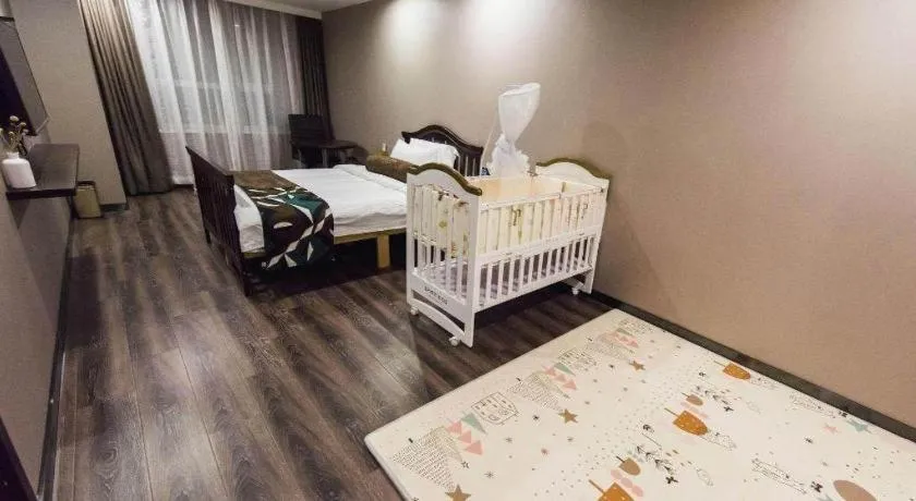 Bed in James Joyce Coffetel Jilin Railway Station Fortune Plaza