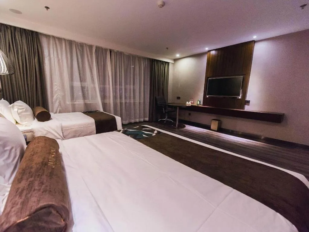 Bed in James Joyce Coffetel Jilin Railway Station Fortune Plaza