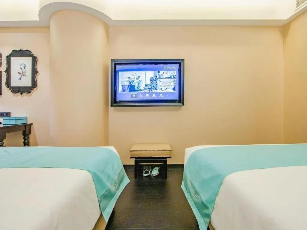 Bed in Xana Hotelle Tianjin Binjiang Road Heping Road Metro Station Quanyechang