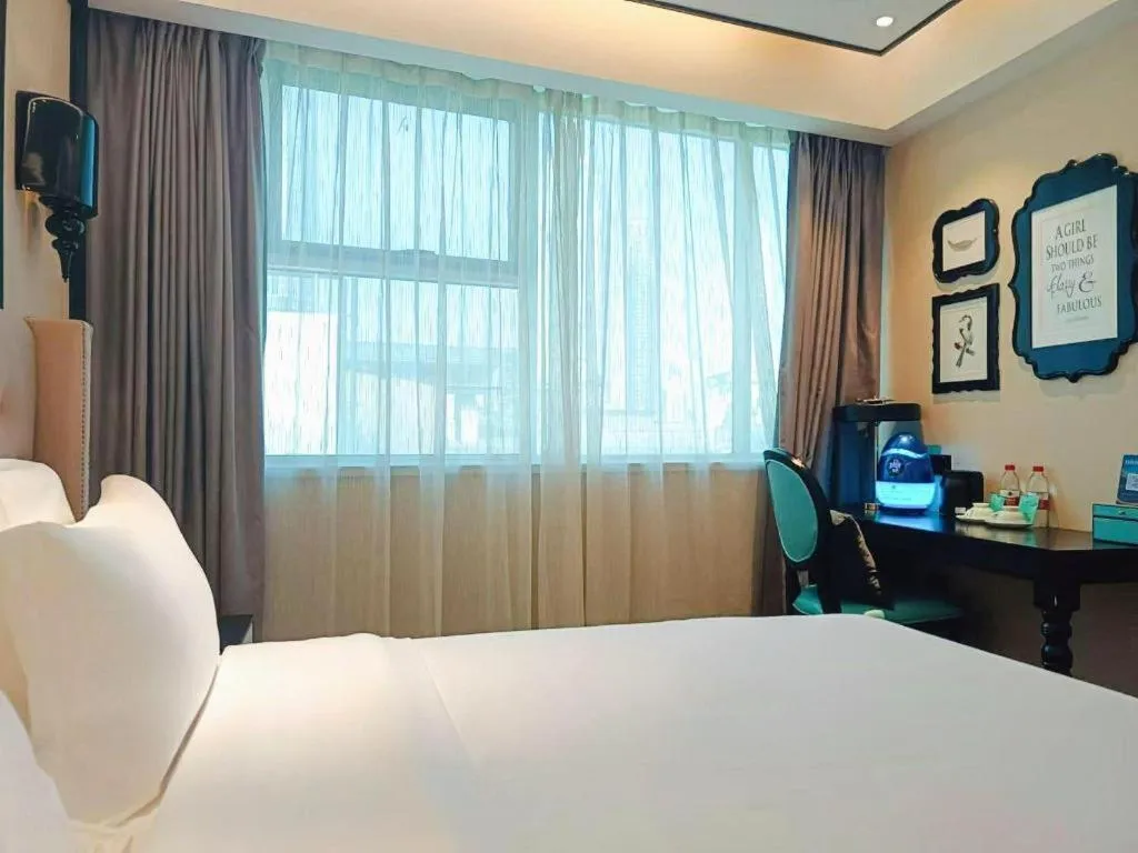 Bed in Xana Hotelle Tianjin Binjiang Road Heping Road Metro Station Quanyechang