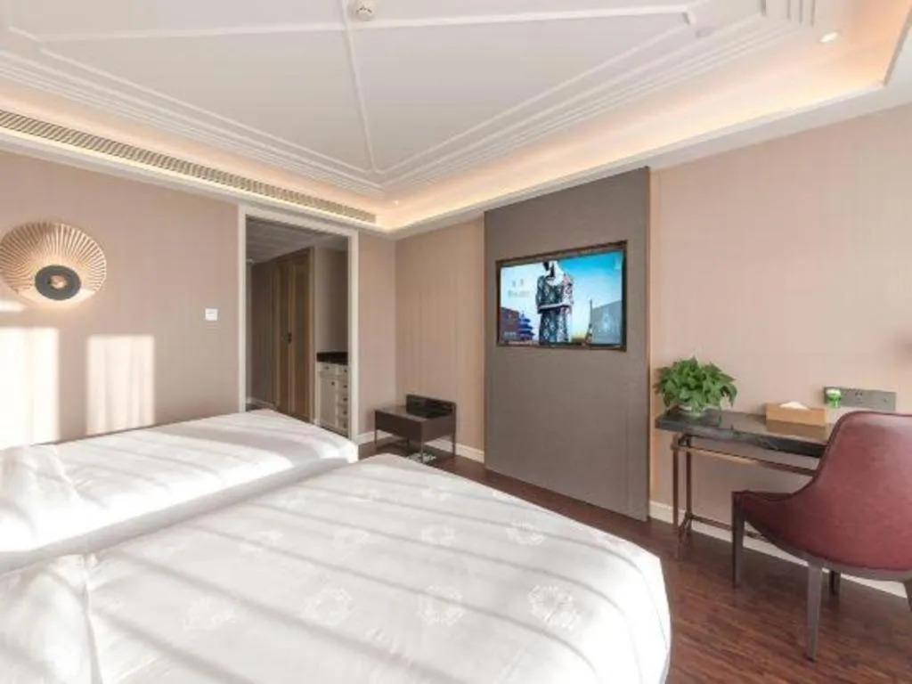 Bed in James Joyce Coffetel Harbin West High-speed Railway Station Wanda Plaza