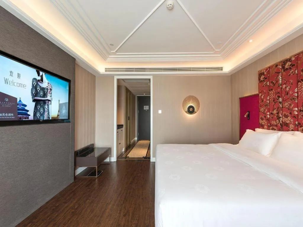 Bed in James Joyce Coffetel Harbin West High-speed Railway Station Wanda Plaza