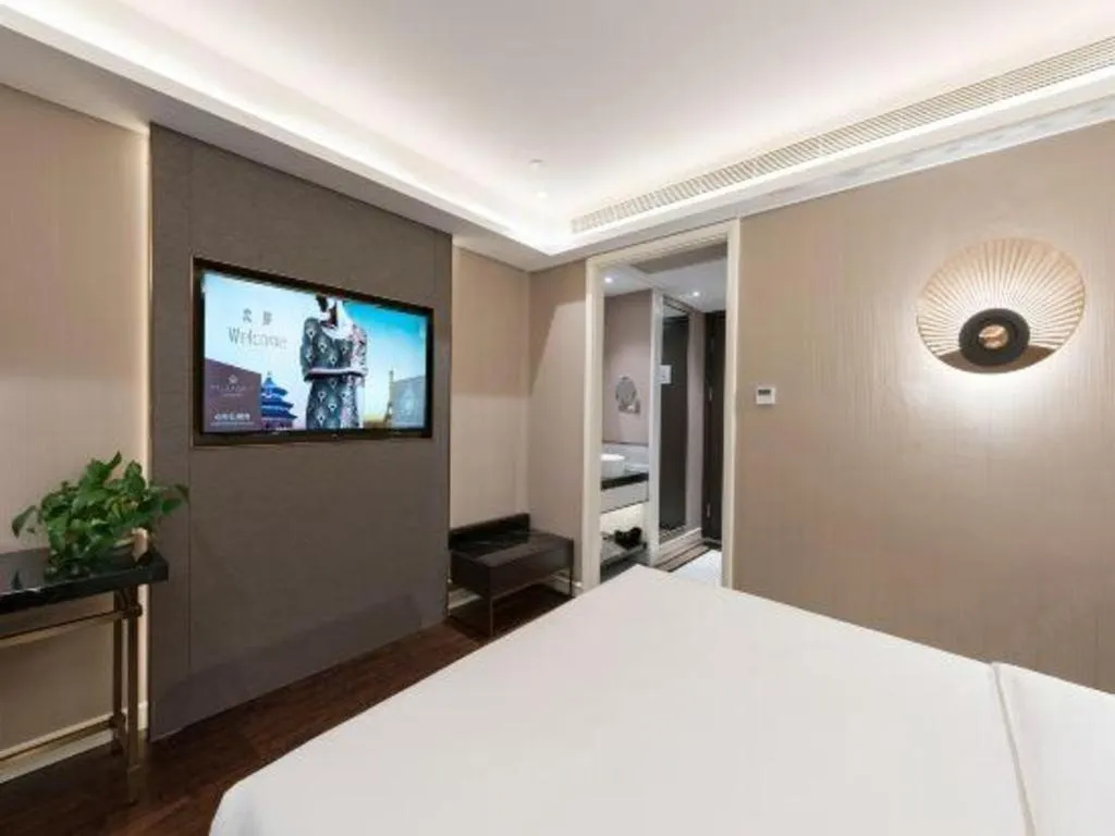 Bed in James Joyce Coffetel Harbin West High-speed Railway Station Wanda Plaza