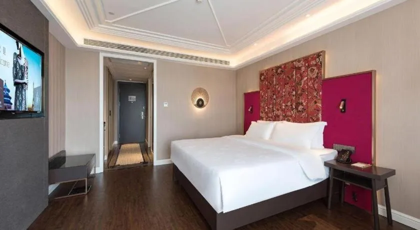 Bed in James Joyce Coffetel Harbin West High-speed Railway Station Wanda Plaza