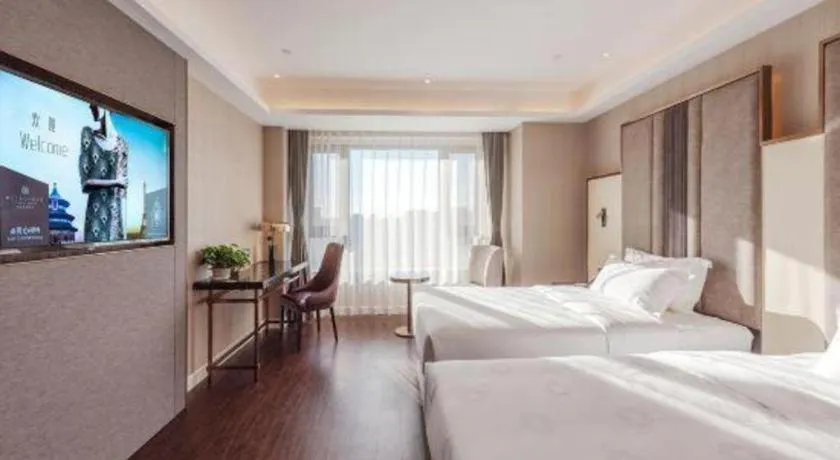 Bed in James Joyce Coffetel Harbin West High-speed Railway Station Wanda Plaza