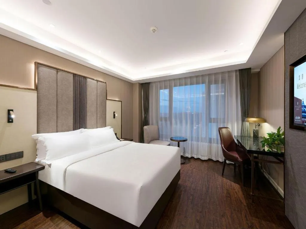 Bed in James Joyce Coffetel Harbin West High-speed Railway Station Wanda Plaza