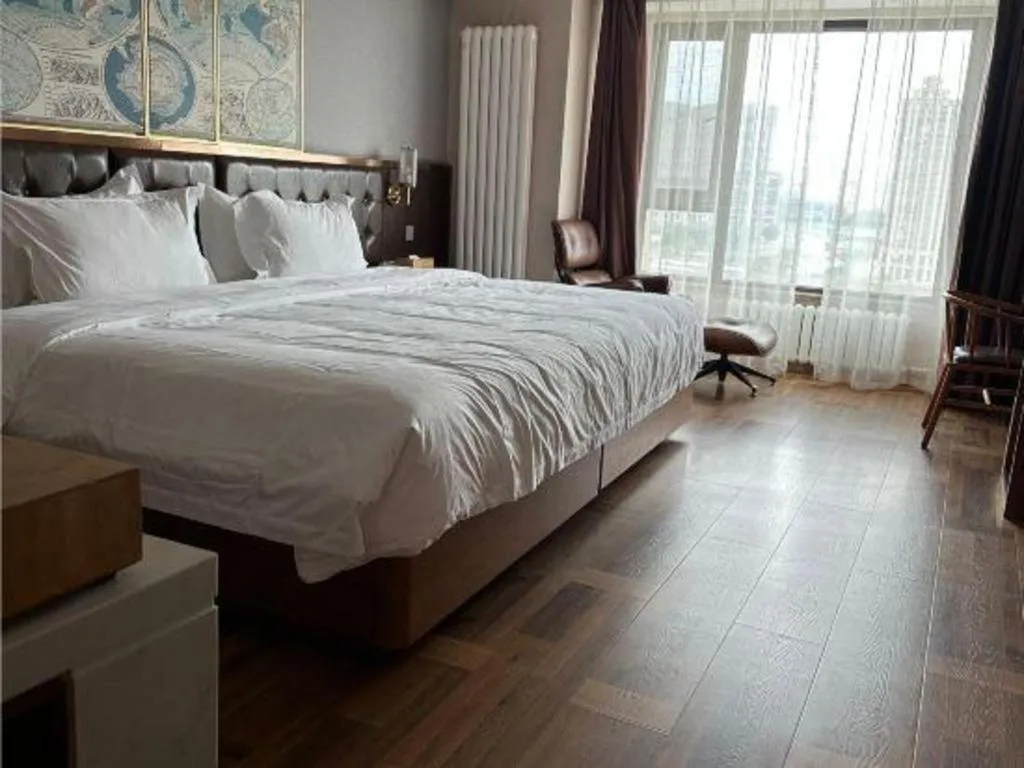 Bed in James Joyce Coffetel Harbin West High-speed Railway Station Wanda Plaza