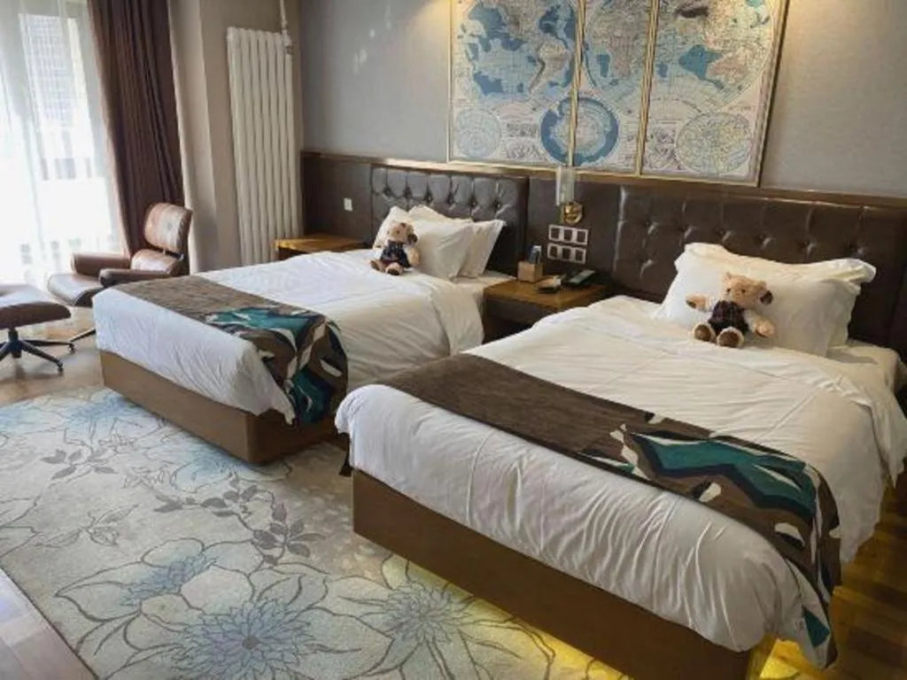 Bed in James Joyce Coffetel Harbin West High-speed Railway Station Wanda Plaza