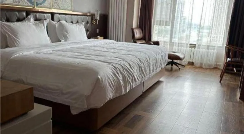 Bed in James Joyce Coffetel Harbin West High-speed Railway Station Wanda Plaza