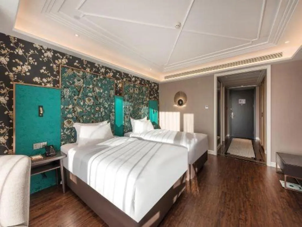 Bed in James Joyce Coffetel Harbin West High-speed Railway Station Wanda Plaza