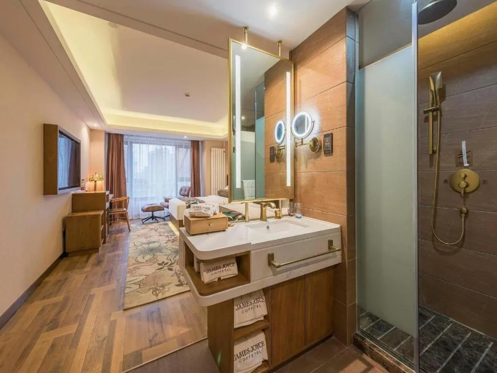 Bed in James Joyce Coffetel Harbin West High-speed Railway Station Wanda Plaza