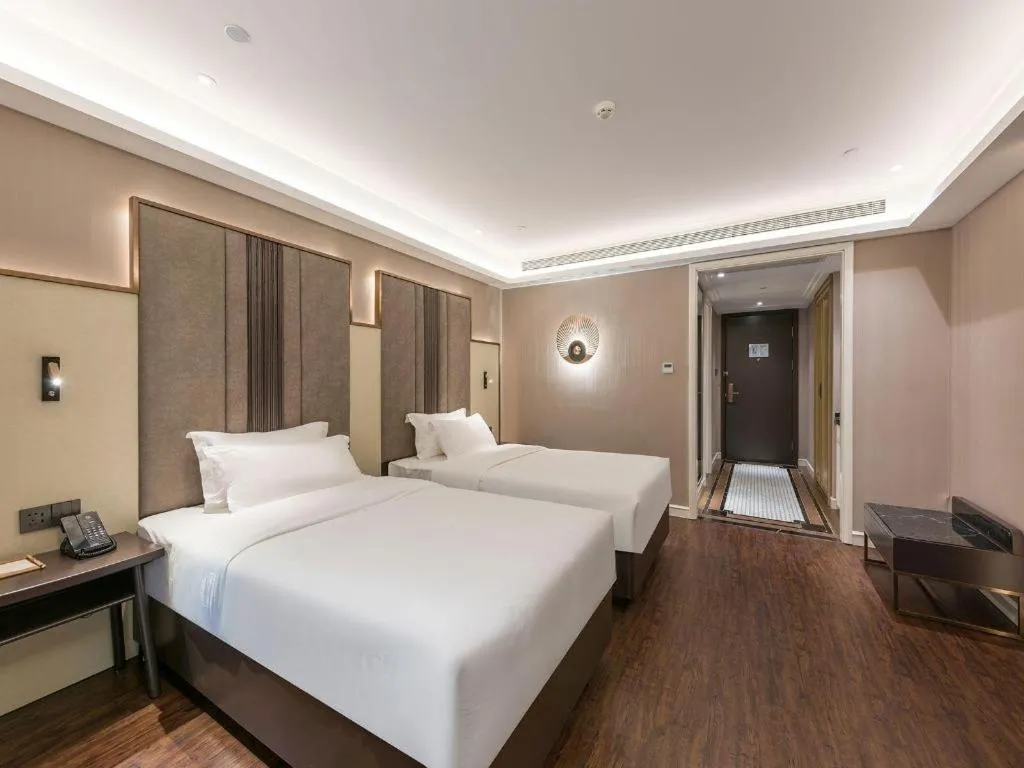 Bed in James Joyce Coffetel Harbin West High-speed Railway Station Wanda Plaza