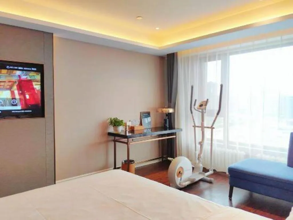 Bed in James Joyce Coffetel Harbin West High-speed Railway Station Wanda Plaza