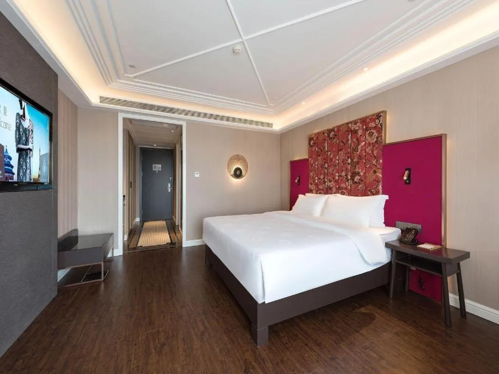 Bed in James Joyce Coffetel Harbin West High-speed Railway Station Wanda Plaza