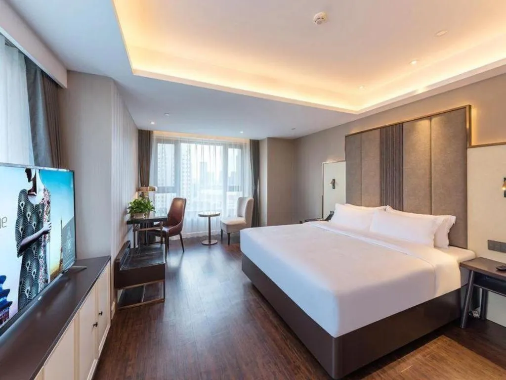 Bed in James Joyce Coffetel Harbin West High-speed Railway Station Wanda Plaza