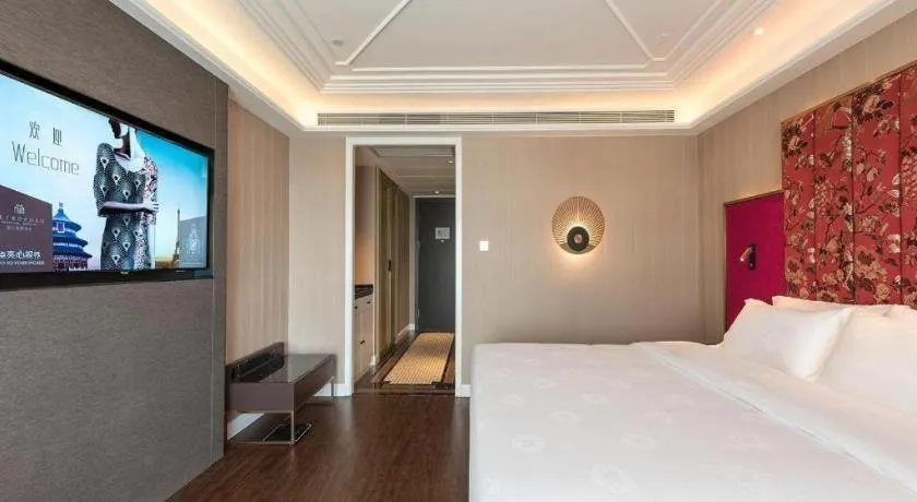 Bed in James Joyce Coffetel Harbin West High-speed Railway Station Wanda Plaza