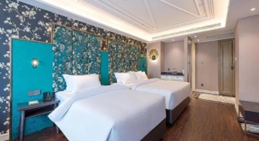 Bed in James Joyce Coffetel Harbin West High-speed Railway Station Wanda Plaza