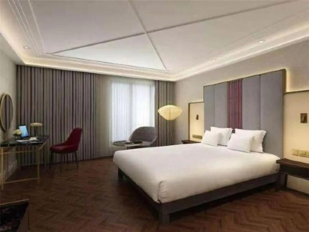 Bed in James Joyce Coffetel Harbin West High-speed Railway Station Wanda Plaza