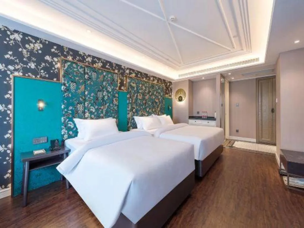 Bed in James Joyce Coffetel Harbin West High-speed Railway Station Wanda Plaza