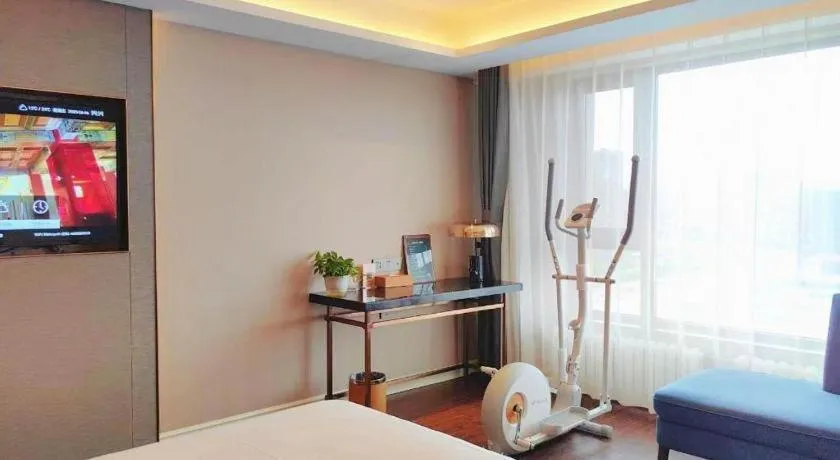 Bed in James Joyce Coffetel Harbin West High-speed Railway Station Wanda Plaza