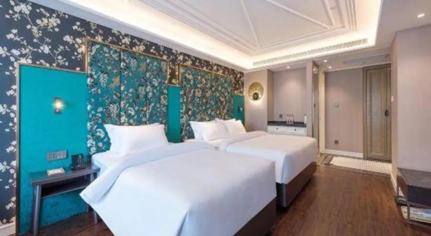 Bed in James Joyce Coffetel Harbin West High-speed Railway Station Wanda Plaza