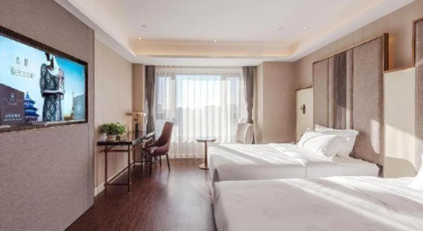 Bed in James Joyce Coffetel Harbin West High-speed Railway Station Wanda Plaza