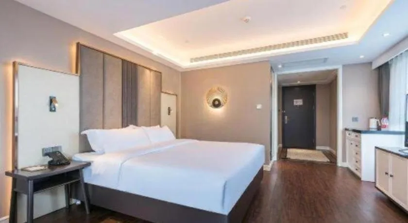 Bed in James Joyce Coffetel Harbin West High-speed Railway Station Wanda Plaza