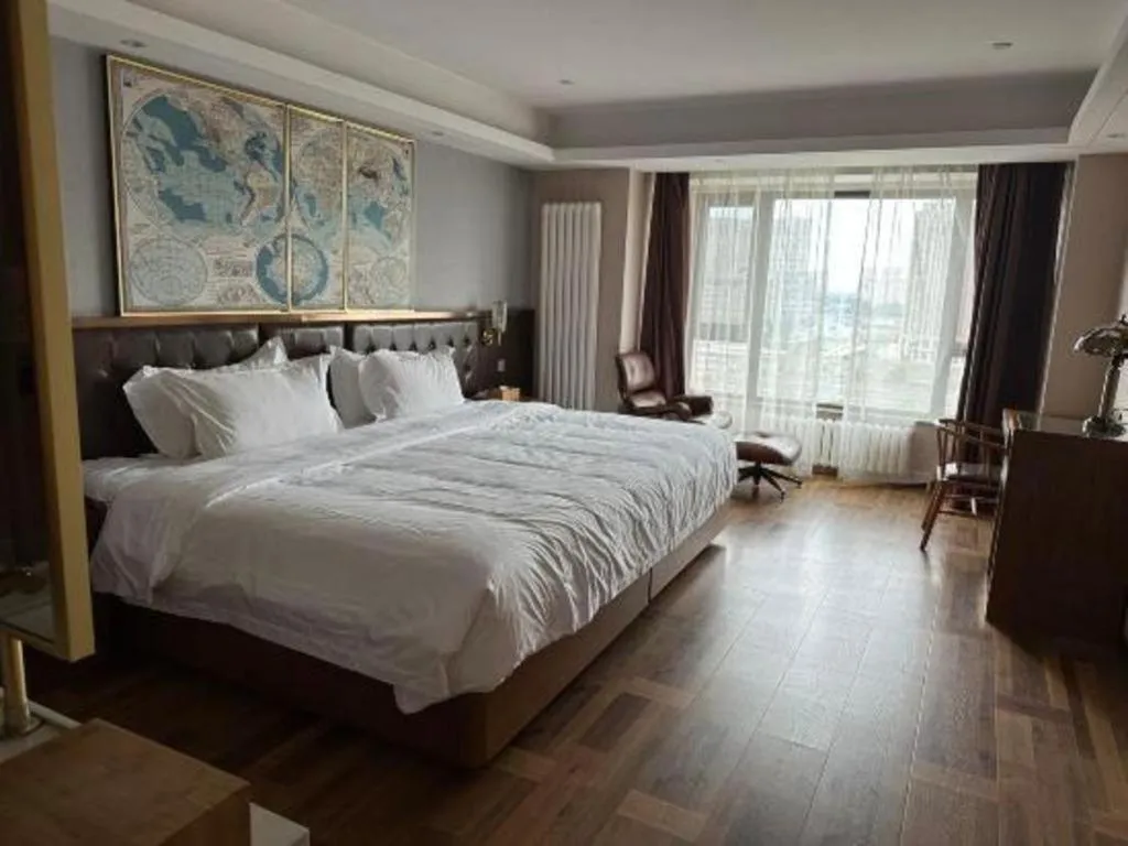 Bed in James Joyce Coffetel Harbin West High-speed Railway Station Wanda Plaza