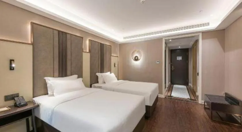 Bed in James Joyce Coffetel Harbin West High-speed Railway Station Wanda Plaza